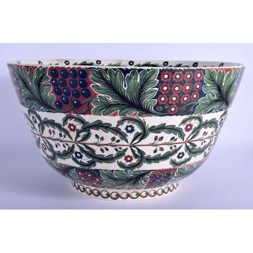 173 - A VERY LARGE ENGLISH ARTS AND CRAFTS CIRCULAR POTTERY BOWL in the manner of William De Morgan, paint... 