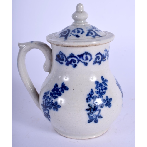 174 - AN 18TH CENTURY FRENCH BLUE AND WHITE SPARROW BEAK JUG AND COVER printed with flowers. 10.5 cm high.