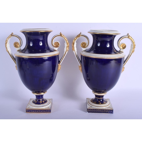 178 - A PAIR OF EARLY 19TH CENTURY DERBY TWIN HANDLED VASES painted with European landscapes. 30 cm x 18 c... 