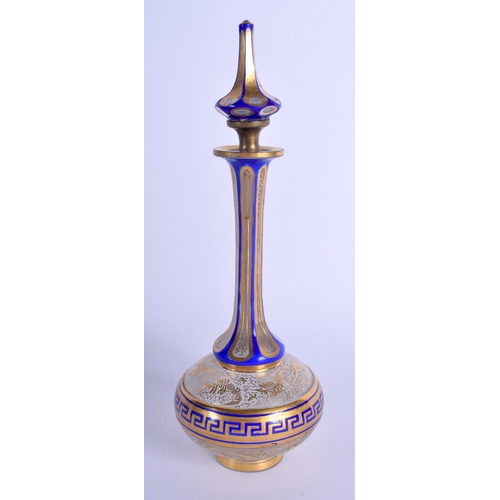 18 - A 19TH CENTURY BOHEMIAN GLASS SCENT BOTTLE AND STOPPER gilded with motifs. 22.5 cm high.