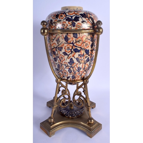 186 - A LARGE 19TH CENTURY CONTINENTAL IMARI STYLE EGG FORM VASE with stylised brass mounts. 35 cm high.