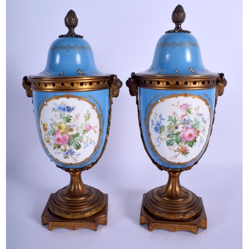 192 - A PAIR OF 19TH CENTURY FRENCH SEVRES PORCELAIN VASES AND COVERS painted with figures and jewelled wi... 