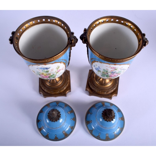 192 - A PAIR OF 19TH CENTURY FRENCH SEVRES PORCELAIN VASES AND COVERS painted with figures and jewelled wi... 