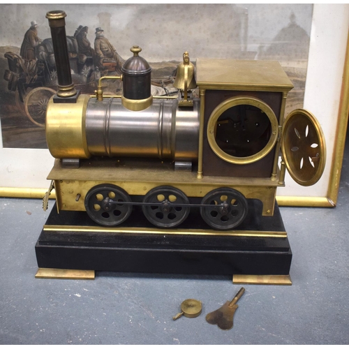 2007 - A LARGE CONTEMPORARY CONTINENTAL LOCOMOTIVE TRAIN CLOCK upon a track. 44 cm x 46 cm.