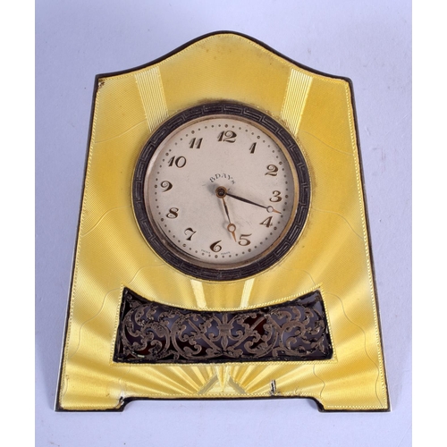 2008 - AN ART DECO CONTINENTAL SILVER AND ENAMEL EIGHT DAY DESK CLOCK. 12 cm x 9 cm.