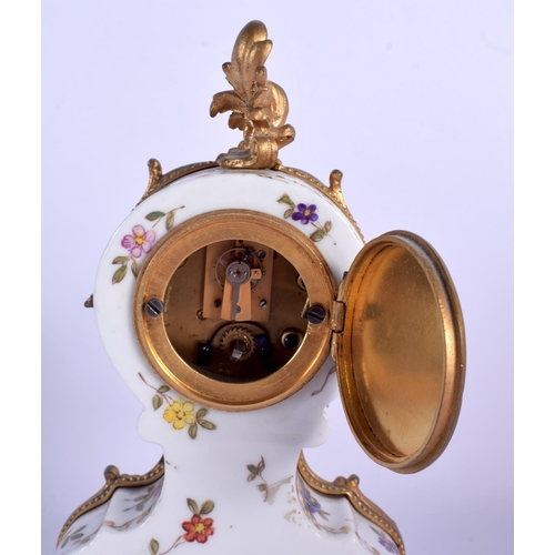 2009 - A 19TH CENTURY EUROPEAN PAINTED ENAMELLED PORCELAIN CLOCK with French bronze mounts. 20 cm x 10 cm.