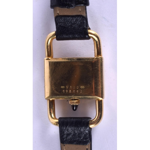 2015 - AN 15CT GOLD KUTCHINSKY RIDERS WATCH. Dial 2.25 cm x 1.5 cm.