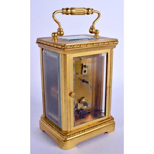 2018 - AN EARLY 20TH CENTURY FRENCH BRASS CARRIAGE CLOCK with silvered dial. 14 cm high inc handle.