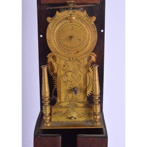 2020 - A RARE 18TH/19TH CENTURY CONTINENTAL WEIGHT DRIVEN TABLE CLOCK formed with a brass dial. 40 cm high.