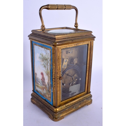 2025 - A 19TH CENTURY FRENCH SEVRES PORCELAIN BRASS CARRIAGE CLOCK painted with lovers within landscapes. 1... 