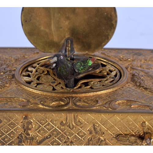 2026 - A 19TH CENTURY SWISS AUTOMATON SINGING BIRD BOX within a repousse case decorated with putti. 10 cm x... 