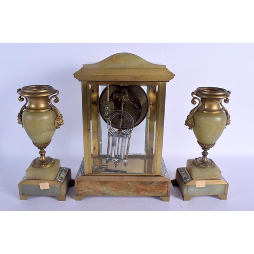 2028 - A LARGE 19TH CENTURY FRENCH CHAMPLEVE ENAMEL CLOCK GARNITURE formed with putti supports. Clock 35 cm... 