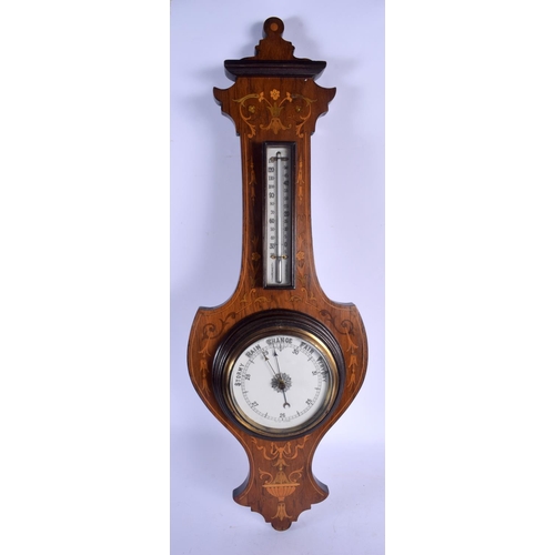 2037 - AN EDWARDIAN BAROMETER. 60 cm long.