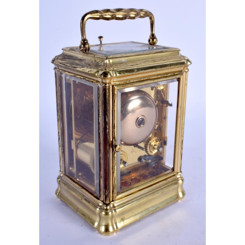 2041 - A SMALL 19TH CENTURY FRENCH BRASS REPEATING CARRIAGE CLOCK with white enamel dial. 13.5 cm inc handl... 