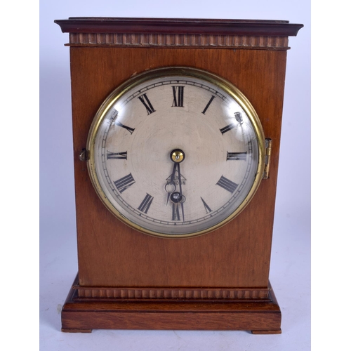 2043 - AN EDWARDIAN DENT OF LONDON MANTEL CLOCK with silvered dial and black numerals. 22 cm x 12 cm.