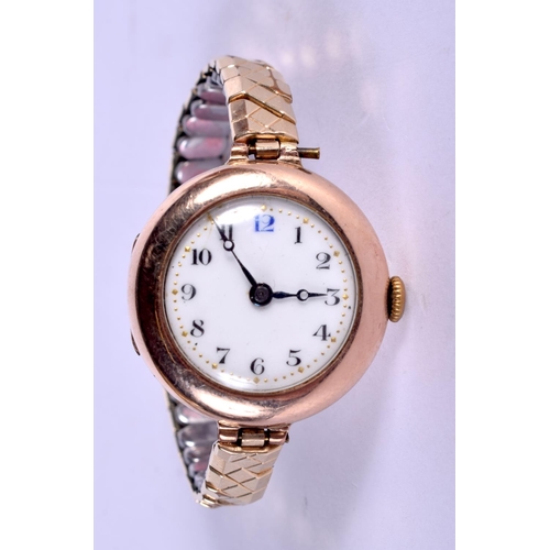 2045 - AN EARLY 20TH CENTURY 9CT GOLD LADIES WRISTWATCH. 2.5 cm diameter.