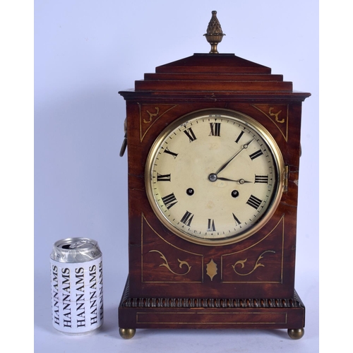 2046 - A LOVELY REGENCY BRASS INLAID MANTEL CLOCK Stollenwerck of Paris, the case decorated with scrolling ... 