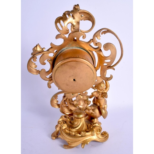 2048 - A 19TH CENTURY FRENCH GILT BRONZE SCROLLING MANTEL CLOCK painted with figures upon an enamelled dial... 