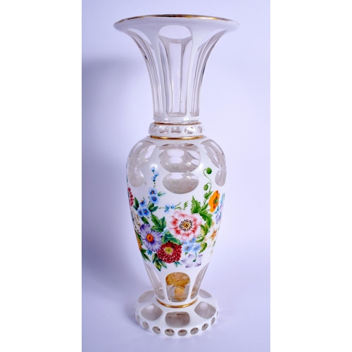 21 - A FINE 19TH CENTURY BOHEMIAN ENAMELLED CLEAR GLASS VASE painted with flowers and trailing vines. 27 ... 