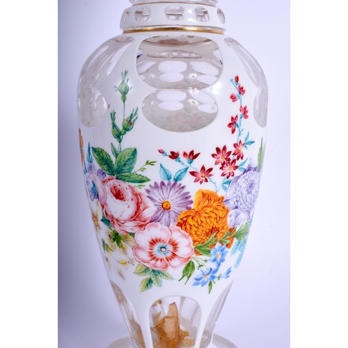 21 - A FINE 19TH CENTURY BOHEMIAN ENAMELLED CLEAR GLASS VASE painted with flowers and trailing vines. 27 ... 