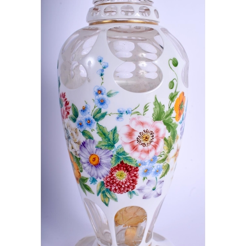 21 - A FINE 19TH CENTURY BOHEMIAN ENAMELLED CLEAR GLASS VASE painted with flowers and trailing vines. 27 ... 