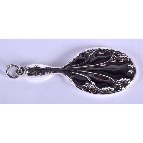 2102 - A MINIATURE SILVER MIRROR. 7.5 cm wide.