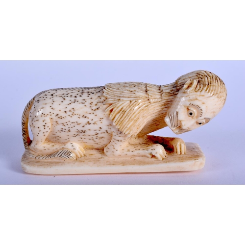 2138 - A RARE 19TH CENTURY FRENCH IVORY CARVED FIGURE OF A MANTICORE. 9 cm x 4 cm.