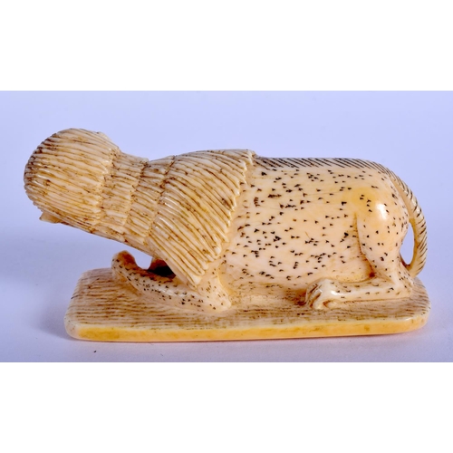 2138 - A RARE 19TH CENTURY FRENCH IVORY CARVED FIGURE OF A MANTICORE. 9 cm x 4 cm.