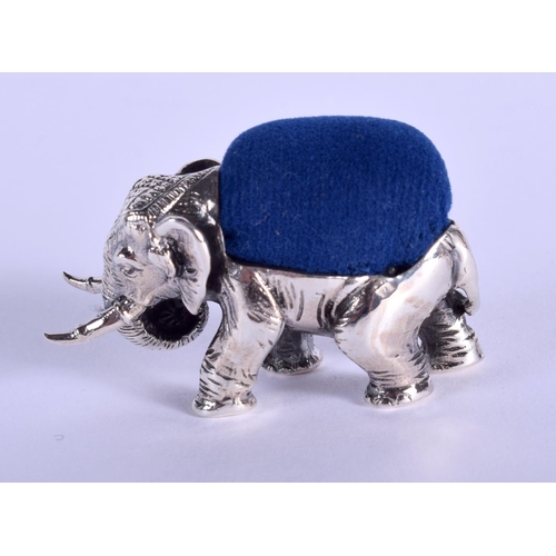 2141 - A SILVER ELEPHANT PIN CUSHION. 3.5 cm wide.