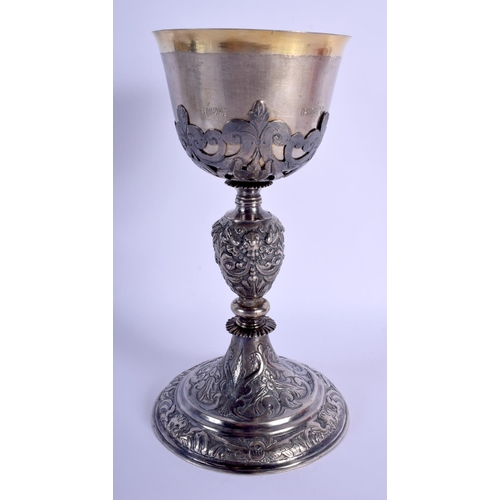 2168 - AN UNUSUAL EARLY CONTINENTAL SILVER GOBLET engraved with saints and inscriptions. 494 grams. 23 cm h... 