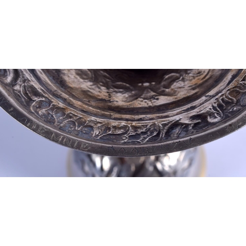 2168 - AN UNUSUAL EARLY CONTINENTAL SILVER GOBLET engraved with saints and inscriptions. 494 grams. 23 cm h... 