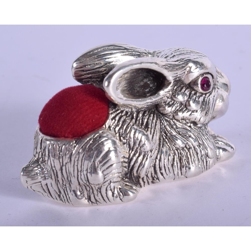 2185 - A SILVER HARE PIN CUSHION. 4.5 cm wide.