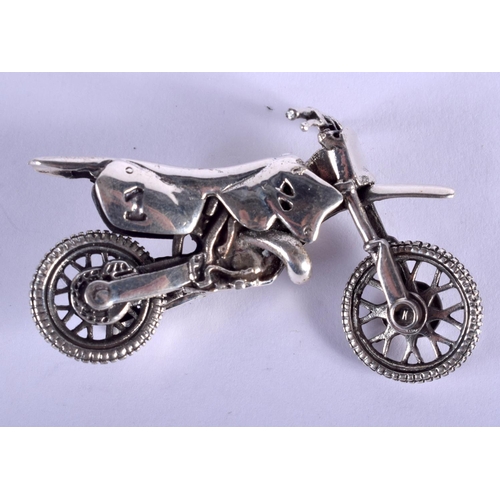 2193 - A SILVER BIKE. 5 cm x 3.5 cm.