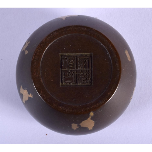 2199 - A CHINESE BRONZE CENSER. 4 cm diameter.