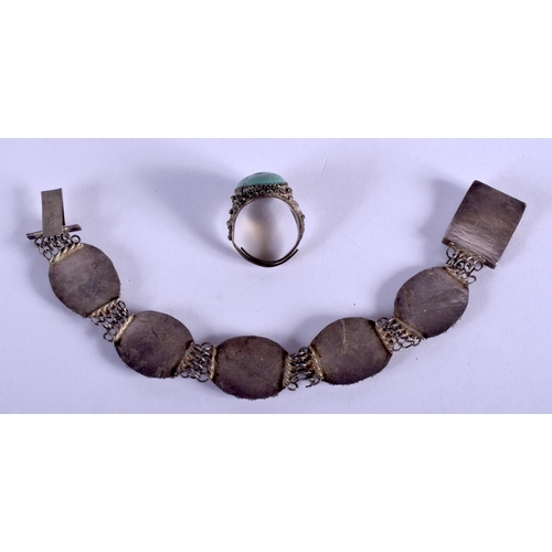 2207 - AN EARLY 20TH CENTURY CHINESE SILVER BRACELET together with a ring. (2)