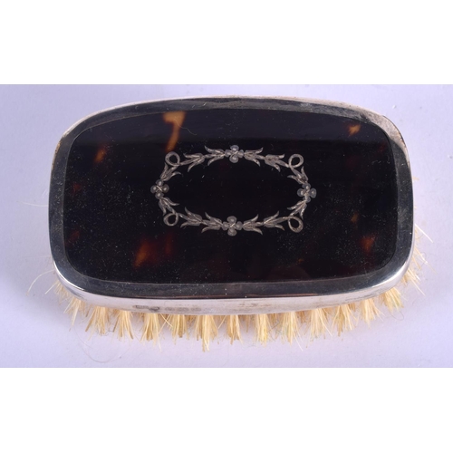 2230 - A BOXED ANTIQUE SILVER AND TORTOISESHELL BRUSH. 8 cm x 4.5 cm.