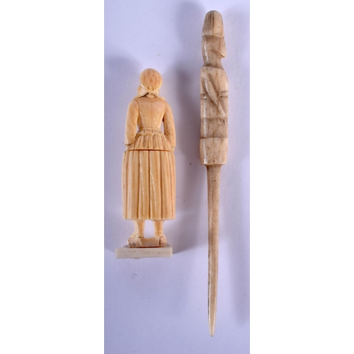 2235 - A 19TH CENTURY CONTINENTAL CARVED IVORY NEEDLE HOLDER together with a early bone stick. (2)