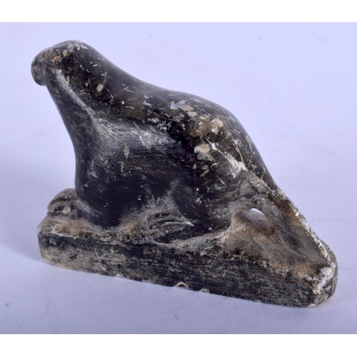 2236 - A NORTH AMERICAN INUIT CARVED STONE SEAL. 3.25 cm wide.