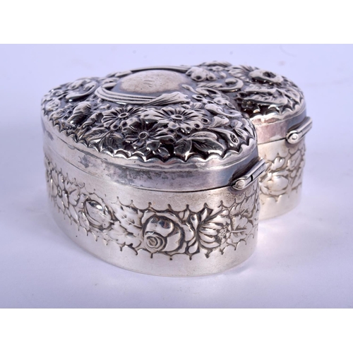 2252 - A VINTAGE SILVER HEART FORM BOX. 61 grams. 6.5 cm x 6.5 cm.