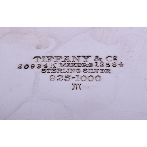 2258 - A LARGE TIFFANY & CO SILVER TRAY. 570 grams. 24.5 cm diameter.