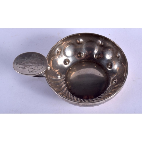 2271 - AN ANTIQUE SILVER WINE TASTER. 66 grams. 10 cm wide.