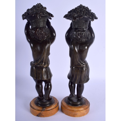 2280 - A PAIR OF 19TH CENTURY FRENCH BRONZE FIGURES OF STANDING PUTTI modelled holding aloft baskets. 28 cm... 