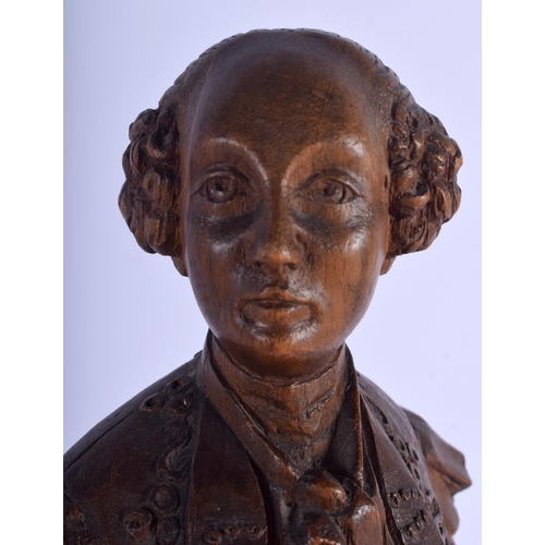 2300 - A LOVELY 19TH CENTURY FRENCH CARVED WOOD FIGURE OF A COMPOSER modelled in robes upon a shaped base. ... 