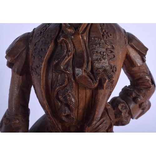 2300 - A LOVELY 19TH CENTURY FRENCH CARVED WOOD FIGURE OF A COMPOSER modelled in robes upon a shaped base. ... 