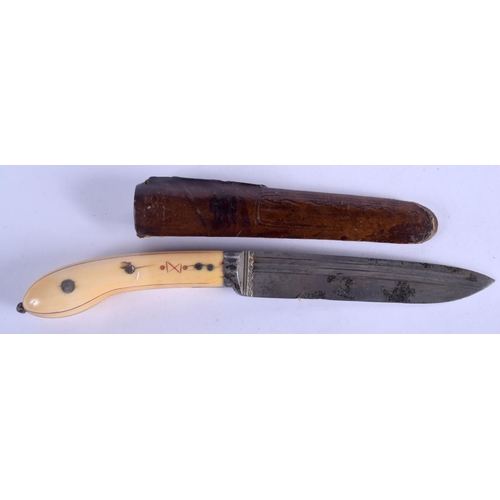 2304 - A 19TH CENTURY MIDDLE EASTERN IVORY HANDLED KNIFE inset with silver work. 27 cm long.