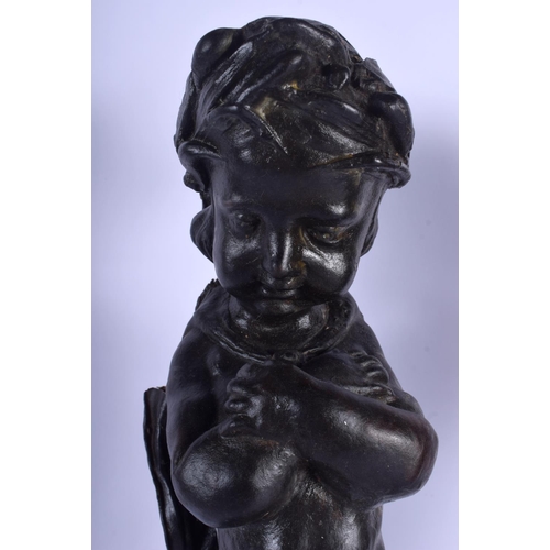 2306 - A RARE PAIR OF 18TH CENTURY EUROPEAN LEATHER FIGURES OF PUTTI modelled upon wood plinths. 50 cm high... 