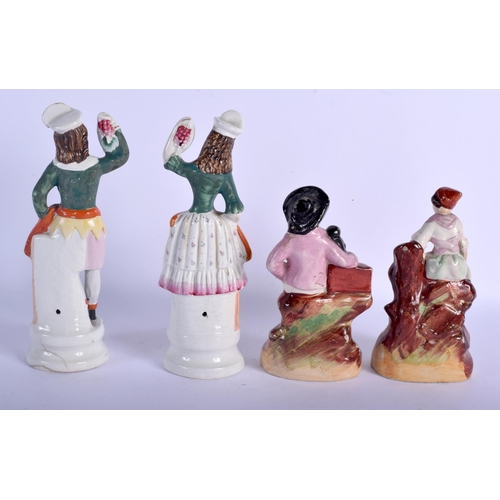 2315 - FOUR 19TH CENTURY STAFFORDSHIRE FIGURES in various forms. Largest 26 cm high. (4)