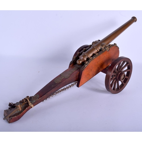 2330 - A 19TH CENTURY EUROPEAN BRONZE CANNON upon a wooden plinth. 50 cm x 20 cm.