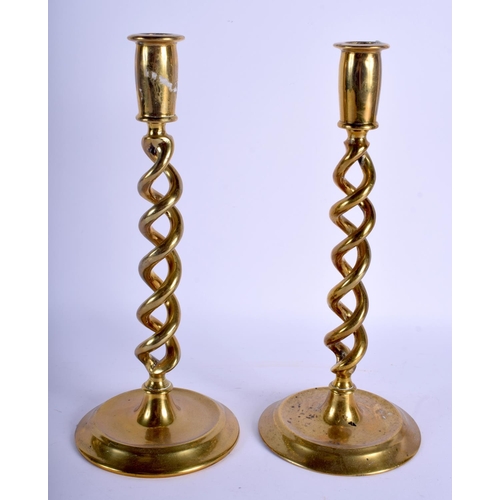 2332 - A PAIR OF 19TH CENTURY CONTINENTAL BRASS CANDLESTICKS. 30 cm high.