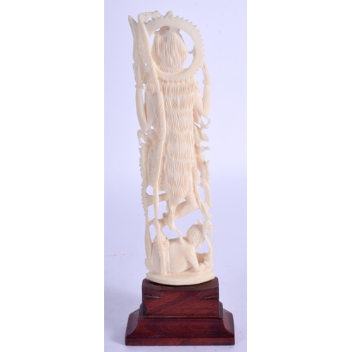 2340 - A 19TH CENTURY ANGLO INDIAN IVORY OKIMONO modelled as a Buddhistic deity. Ivory 15 cm high.